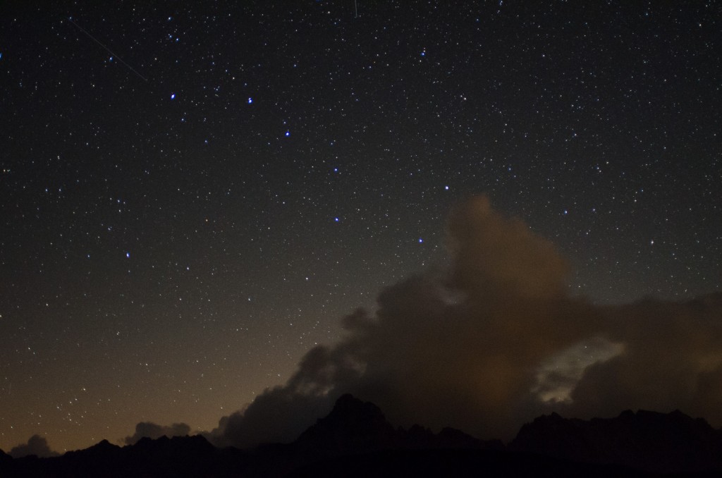 Clouds are come in from the West below the Big Dipper asterism in the Ursa Major constellation.