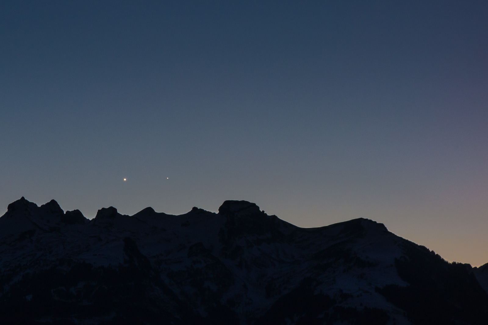 Venus and Mercury above the swiss mountains.